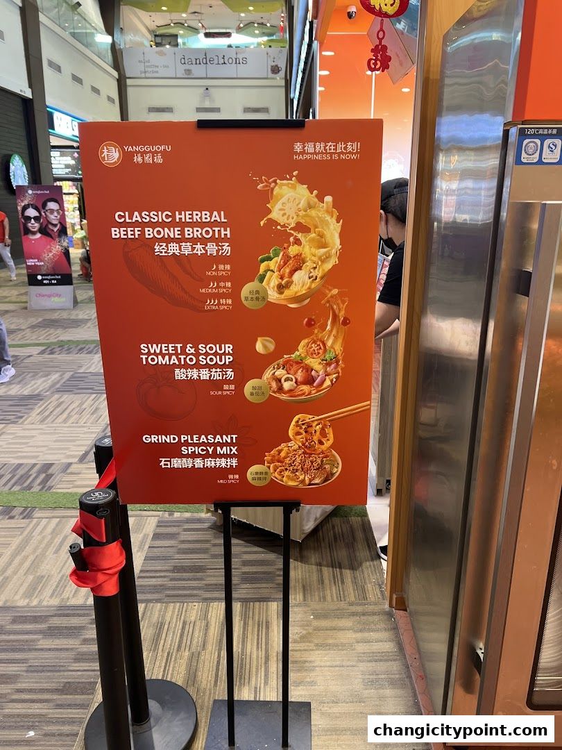 A sign displays soup options from Yang Guo Fu Mala Tang at Changi City Point.