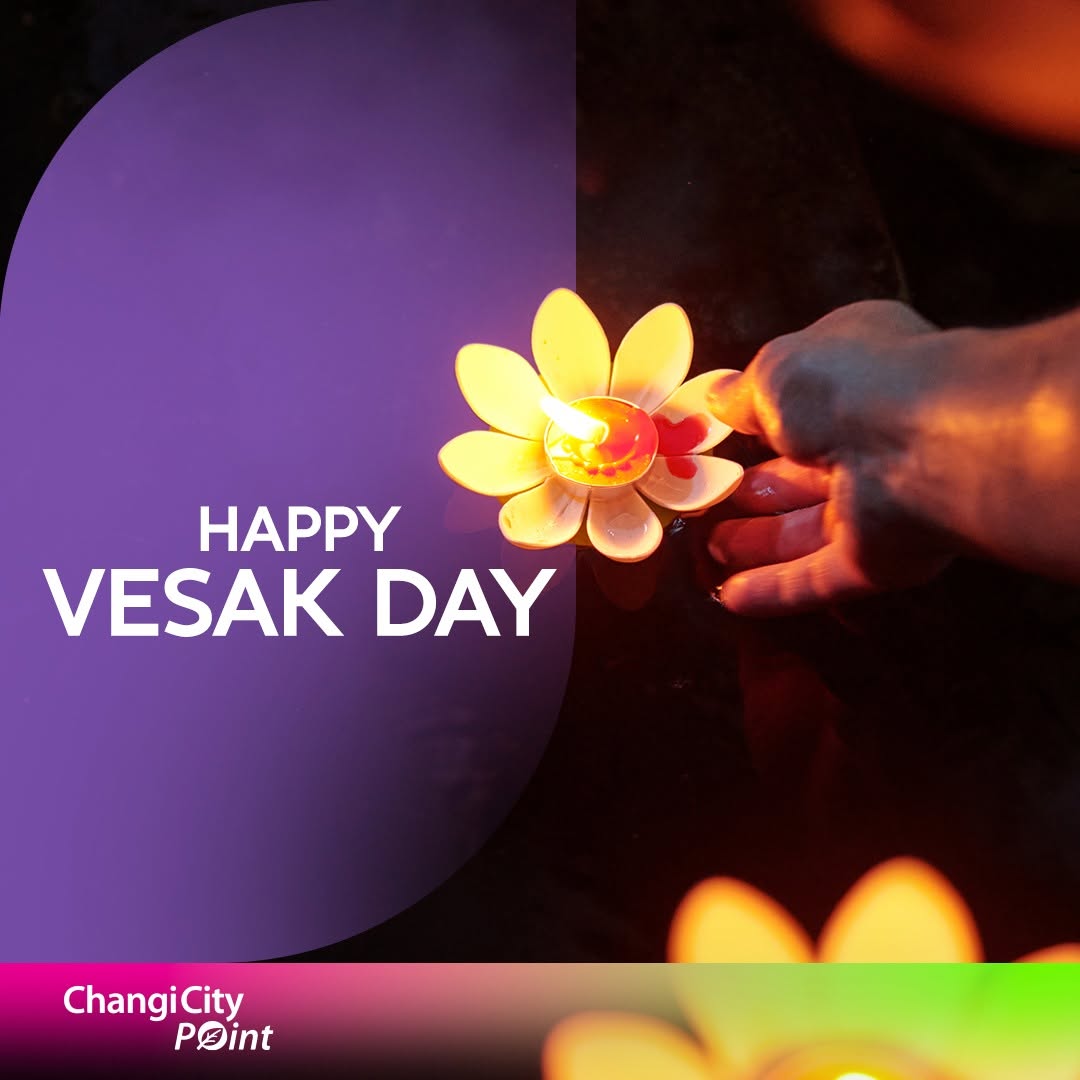 Vesak Day greeting from Changi City Point with lit oil lamp on water